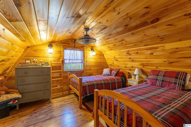 72 Alexandria Heights Cir, Alexandria, AL 36250 - bedroom with wooden ceiling, light wood finished floors, wooden walls, and lofted ceiling