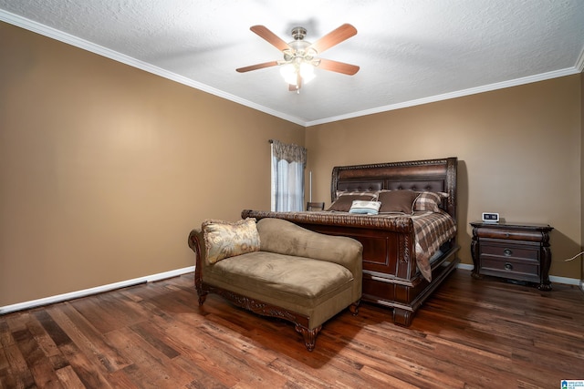 bedroom with dark wood-style floors, baseboards, a textured ceiling, and ornamental molding