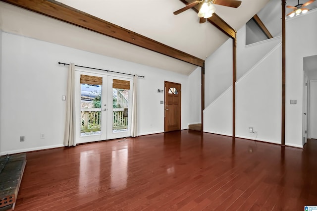 unfurnished living room with baseboards, ceiling fan, wood finished floors, stairs, and french doors