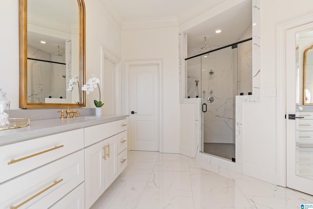 full bath featuring vanity, a marble finish shower, recessed lighting, crown molding, and marble finish floor