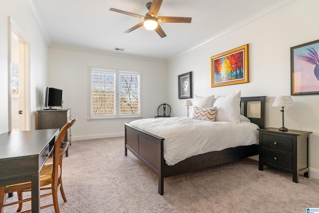 bedroom featuring visible vents, baseboards, ceiling fan, crown molding, and light colored carpet