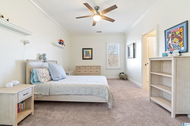 carpeted bedroom featuring visible vents, ceiling fan, baseboards, and ornamental molding