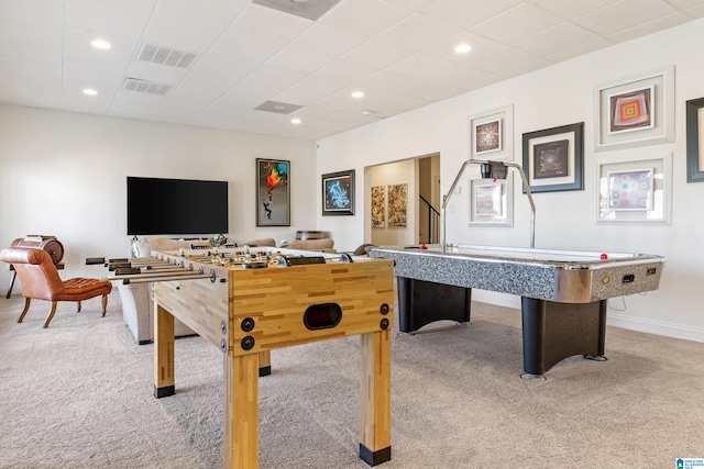 recreation room with visible vents, a drop ceiling, recessed lighting, baseboards, and light colored carpet