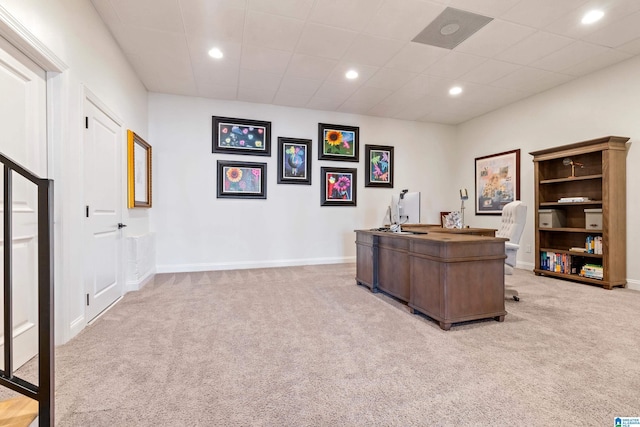 home office featuring recessed lighting, a drop ceiling, baseboards, and light colored carpet