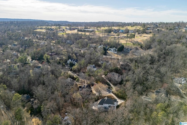 aerial view with a wooded view