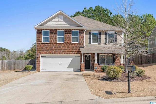 view of front of property featuring a garage, driveway, brick siding, and fence