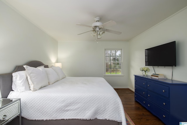 bedroom featuring ornamental molding, baseboards, ceiling fan, and dark wood-style flooring