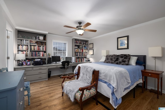 bedroom featuring crown molding, light wood-style flooring, and ceiling fan