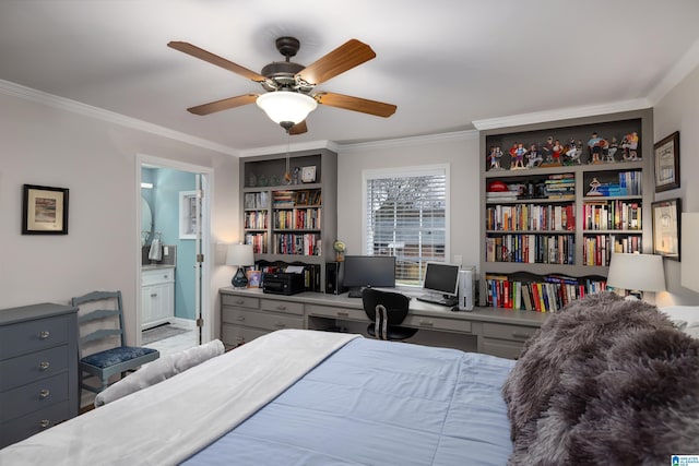 bedroom featuring ceiling fan, ensuite bath, and ornamental molding