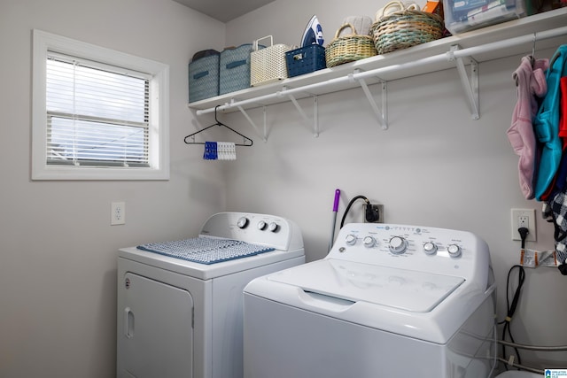 laundry room with washing machine and dryer and laundry area