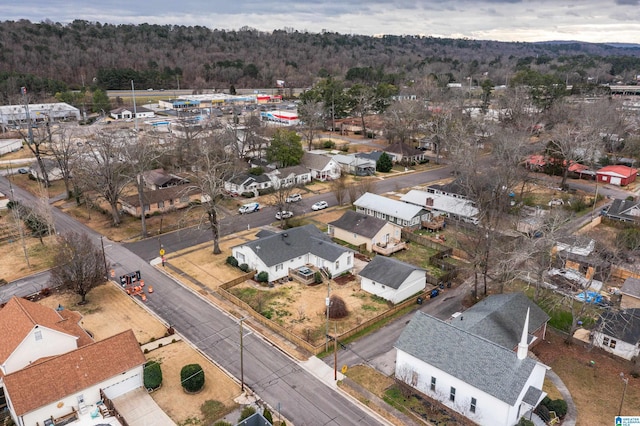 aerial view with a wooded view