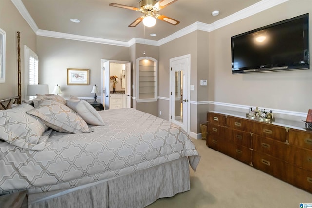 bedroom with baseboards, ceiling fan, light colored carpet, ornamental molding, and ensuite bath