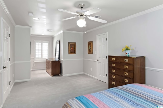 carpeted bedroom featuring a ceiling fan, crown molding, visible vents, and baseboards