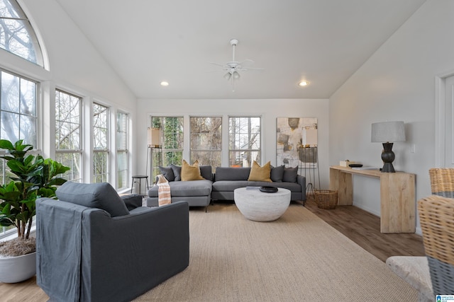 living room featuring high vaulted ceiling, recessed lighting, a ceiling fan, and wood finished floors