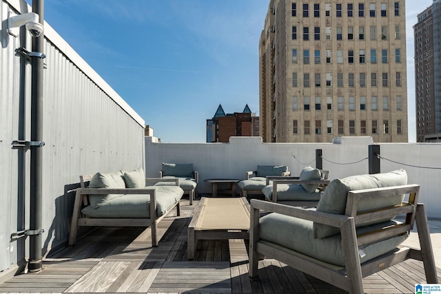 300 20th Ave N Unit 204, Birmingham, AL 35203 - deck featuring an outdoor hangout area, a city view, and fence