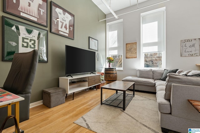 300 20th Ave N Unit 204, Birmingham, AL 35203 - living room with baseboards and wood finished floors