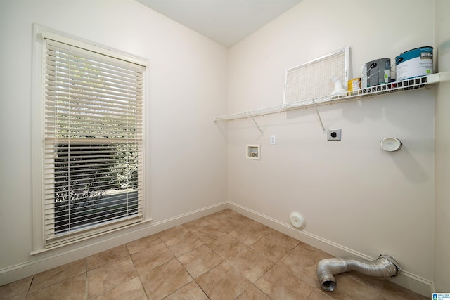 washroom with laundry area, baseboards, hookup for a gas dryer, hookup for an electric dryer, and washer hookup