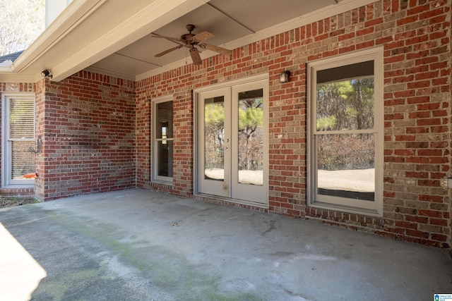 view of patio with ceiling fan and french doors