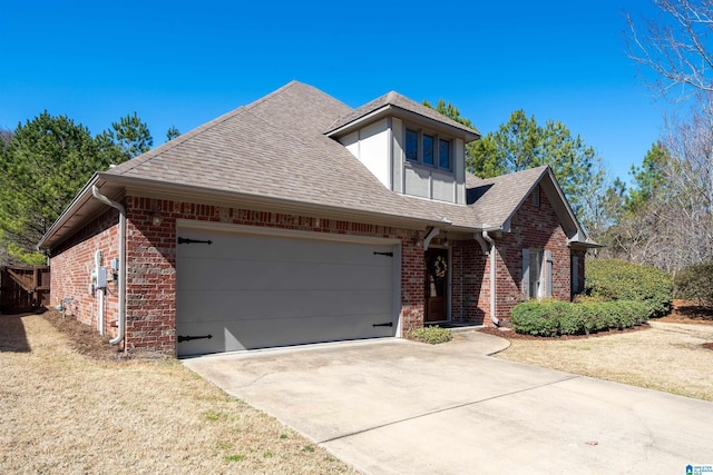 view of front of property with a garage, concrete driveway, brick siding, and roof with shingles