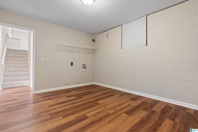 laundry room featuring gas dryer hookup, laundry area, washer hookup, and wood finished floors