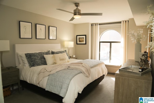 carpeted bedroom featuring ceiling fan