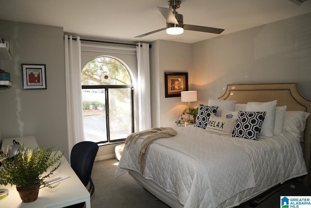 carpeted bedroom featuring a ceiling fan