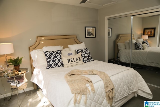 bedroom featuring a closet, attic access, and baseboards