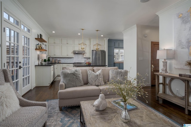 living room with recessed lighting, dark wood-style floors, and ornamental molding