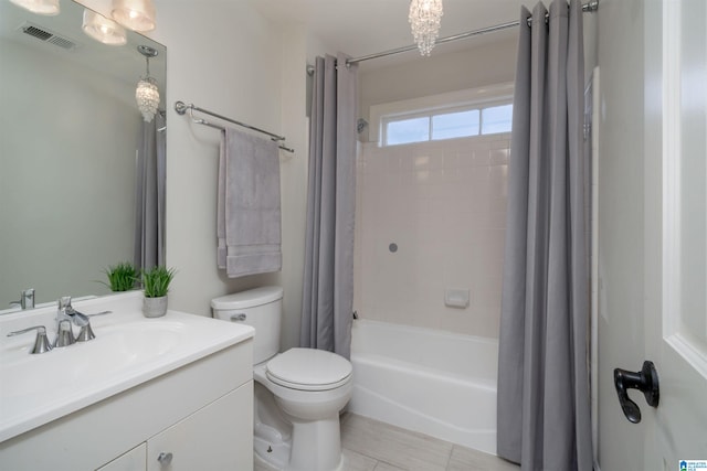 full bath with visible vents, toilet, shower / tub combo with curtain, and vanity