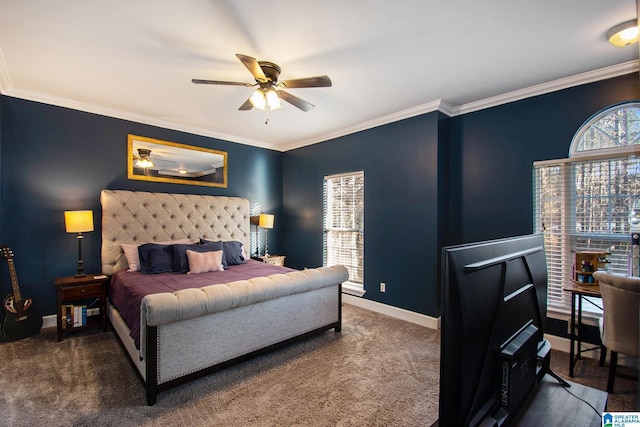 carpeted bedroom featuring multiple windows, a ceiling fan, baseboards, and ornamental molding