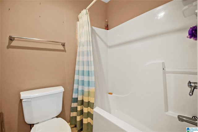 bathroom featuring toilet and shower / bathtub combination with curtain