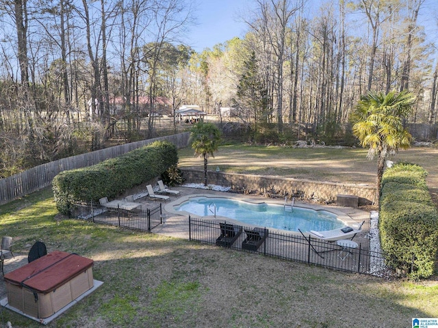 view of pool featuring a yard, a patio, a fenced in pool, and a fenced backyard