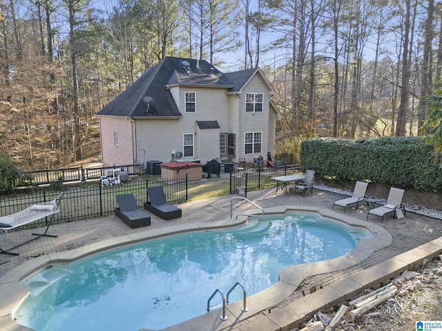 view of pool featuring a fenced in pool, a patio, and fence