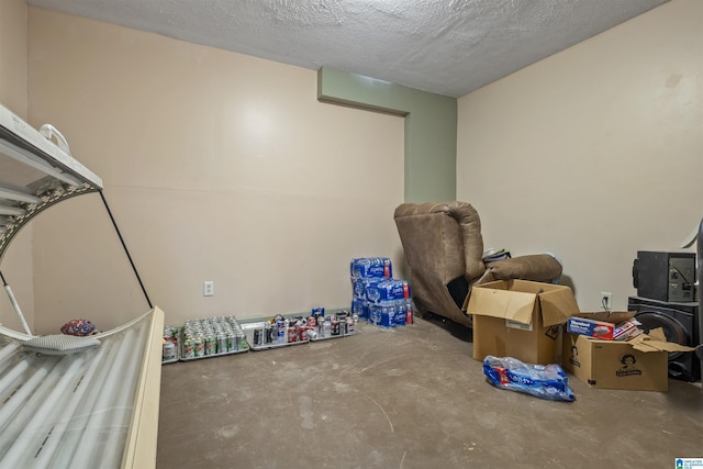 basement with a textured ceiling