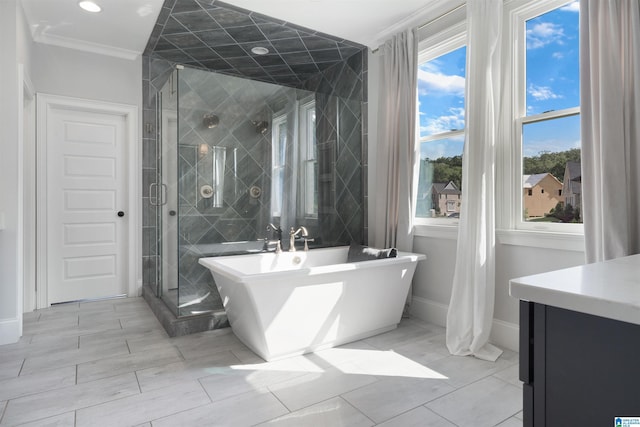 full bath with crown molding, baseboards, a stall shower, and a freestanding bath