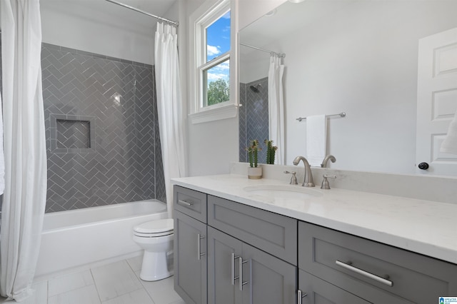 full bath with vanity, toilet, and shower / tub combo