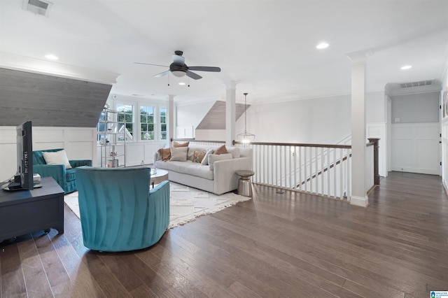 living area with recessed lighting, visible vents, dark wood-style flooring, and ceiling fan with notable chandelier