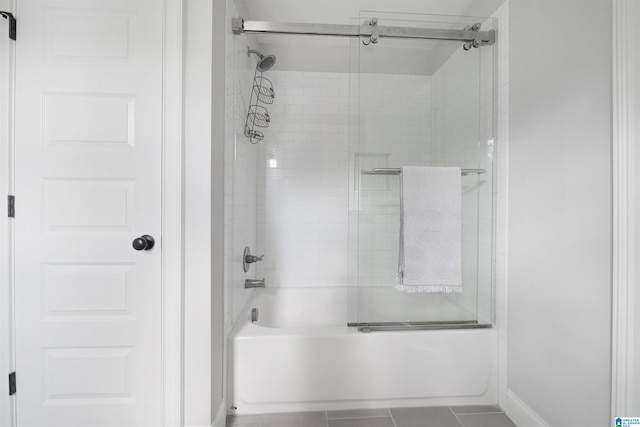 full bathroom with tile patterned floors and shower / bath combination with glass door