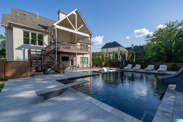 back of house with stairs, a patio, and fence