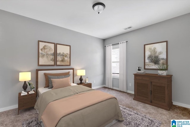 bedroom with carpet, visible vents, and baseboards