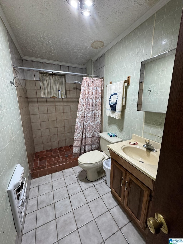 full bathroom with tiled shower, heating unit, crown molding, a textured ceiling, and tile walls