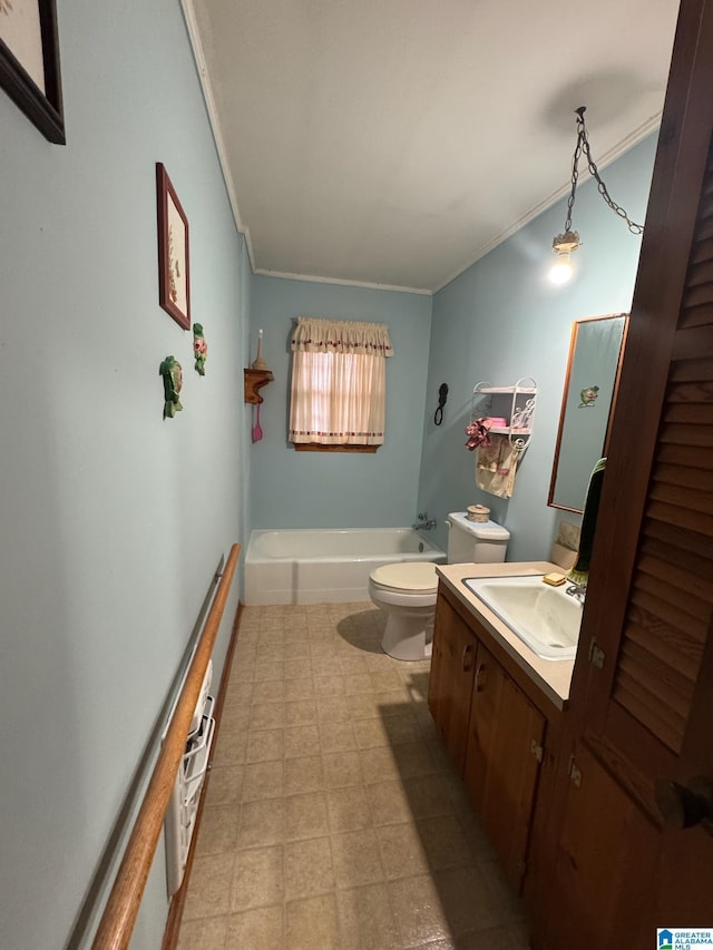 bathroom featuring toilet, a tub, crown molding, and vanity