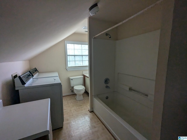 full bathroom with toilet, shower / bath combination, vaulted ceiling, and independent washer and dryer