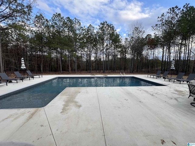 pool featuring a patio