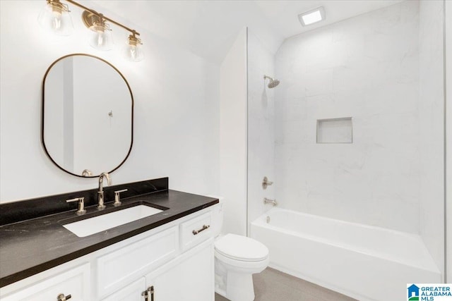 bathroom with vanity, toilet, and tub / shower combination