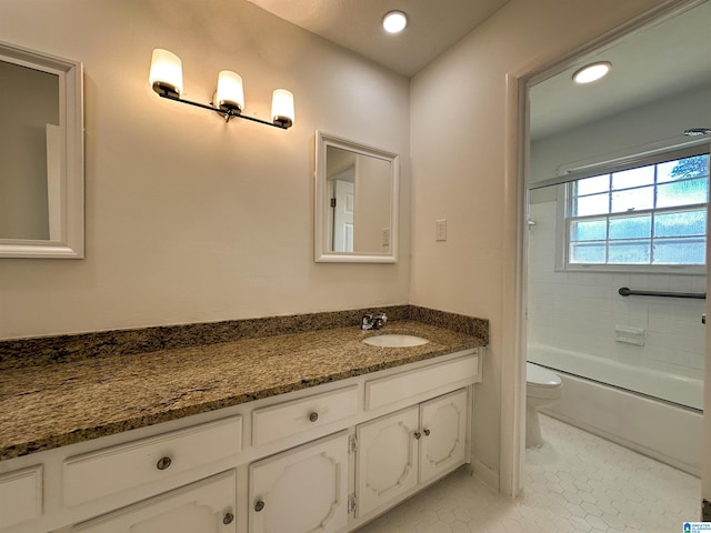 full bathroom featuring vanity, washtub / shower combination, recessed lighting, tile patterned flooring, and toilet