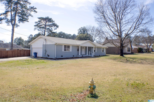 ranch-style home featuring a garage, fence, a front yard, crawl space, and brick siding