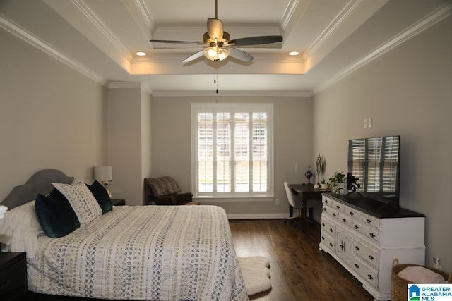 bedroom featuring baseboards, dark wood-style flooring, ceiling fan, crown molding, and a raised ceiling