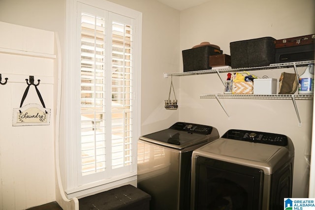 laundry area with laundry area and independent washer and dryer