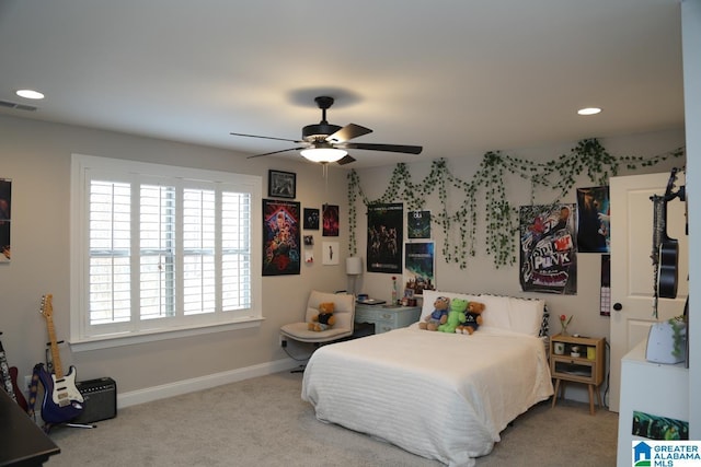 bedroom featuring visible vents, baseboards, carpet, recessed lighting, and a ceiling fan